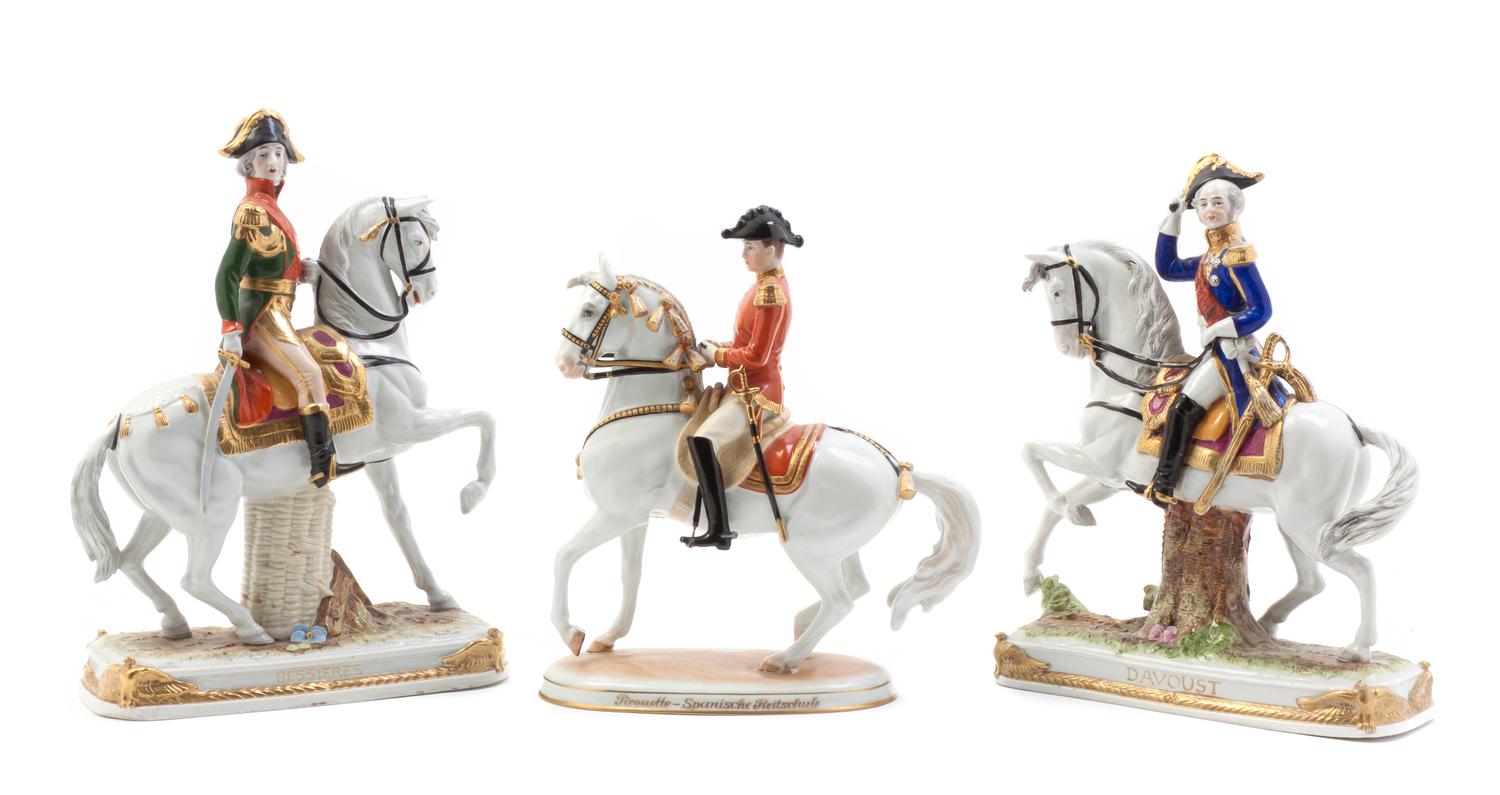 Three German Porcelain Equestrian Figural Groups, Height of tallest 11 1/4 inches.