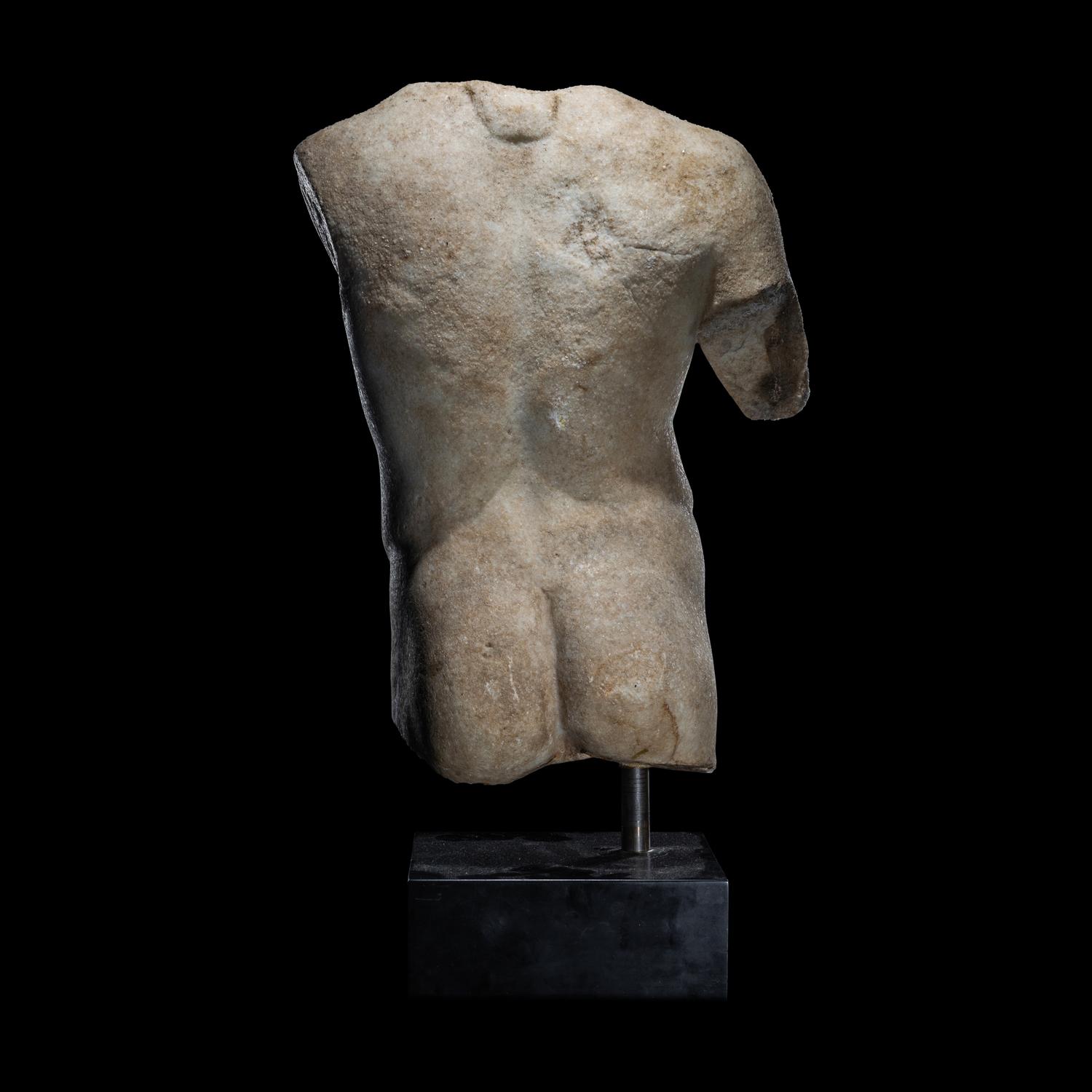 A Roman Marble Torso of a Youthful God or Satyr
