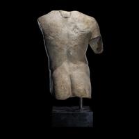 A Roman Marble Torso of a Youthful God or Satyr