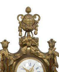 A Louis XVI Style Gilt Bronze Cartel Clock