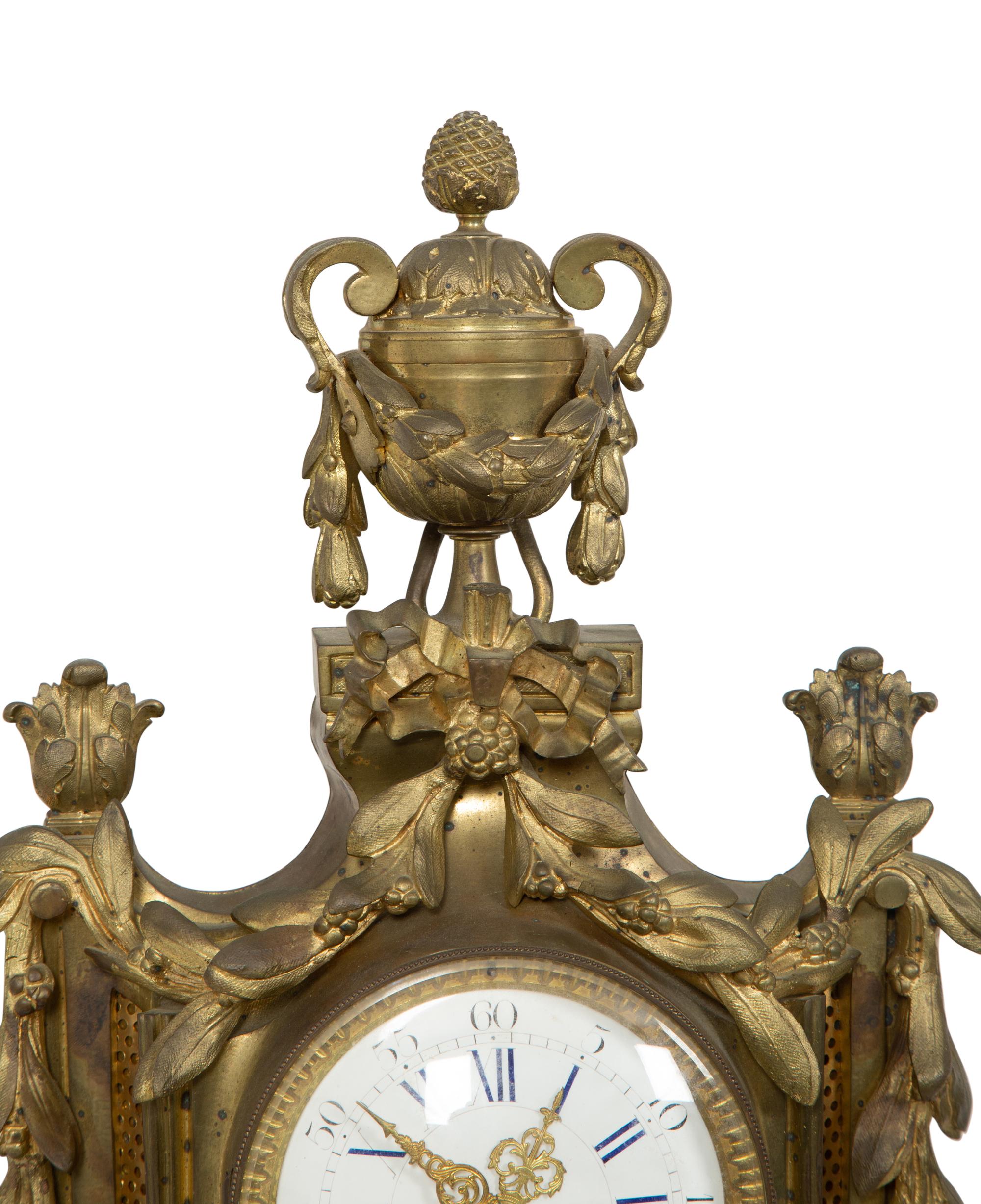A Louis XVI Style Gilt Bronze Cartel Clock