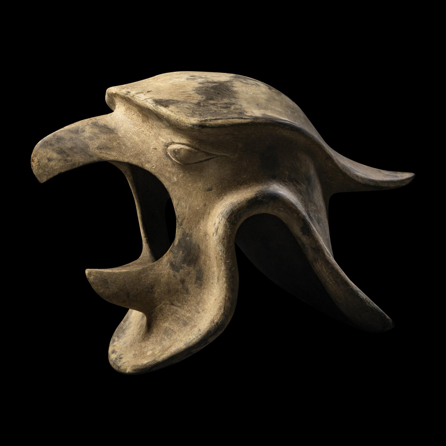 An Aztec Carved Wood Helmet of the Eagle Warrior