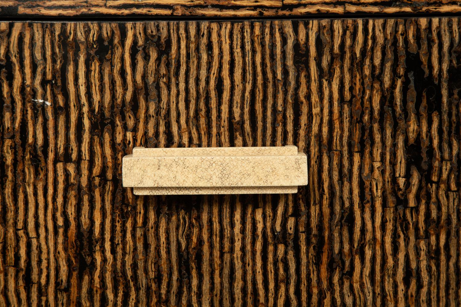 A Contemporary Palmwood-Veneered Chest of Drawers
