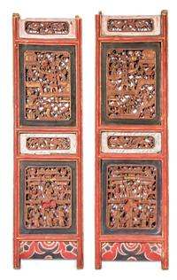 A Pair of Carved Wood Panels Height 53 3/4 x width of each panel 15 3/4 inches.
