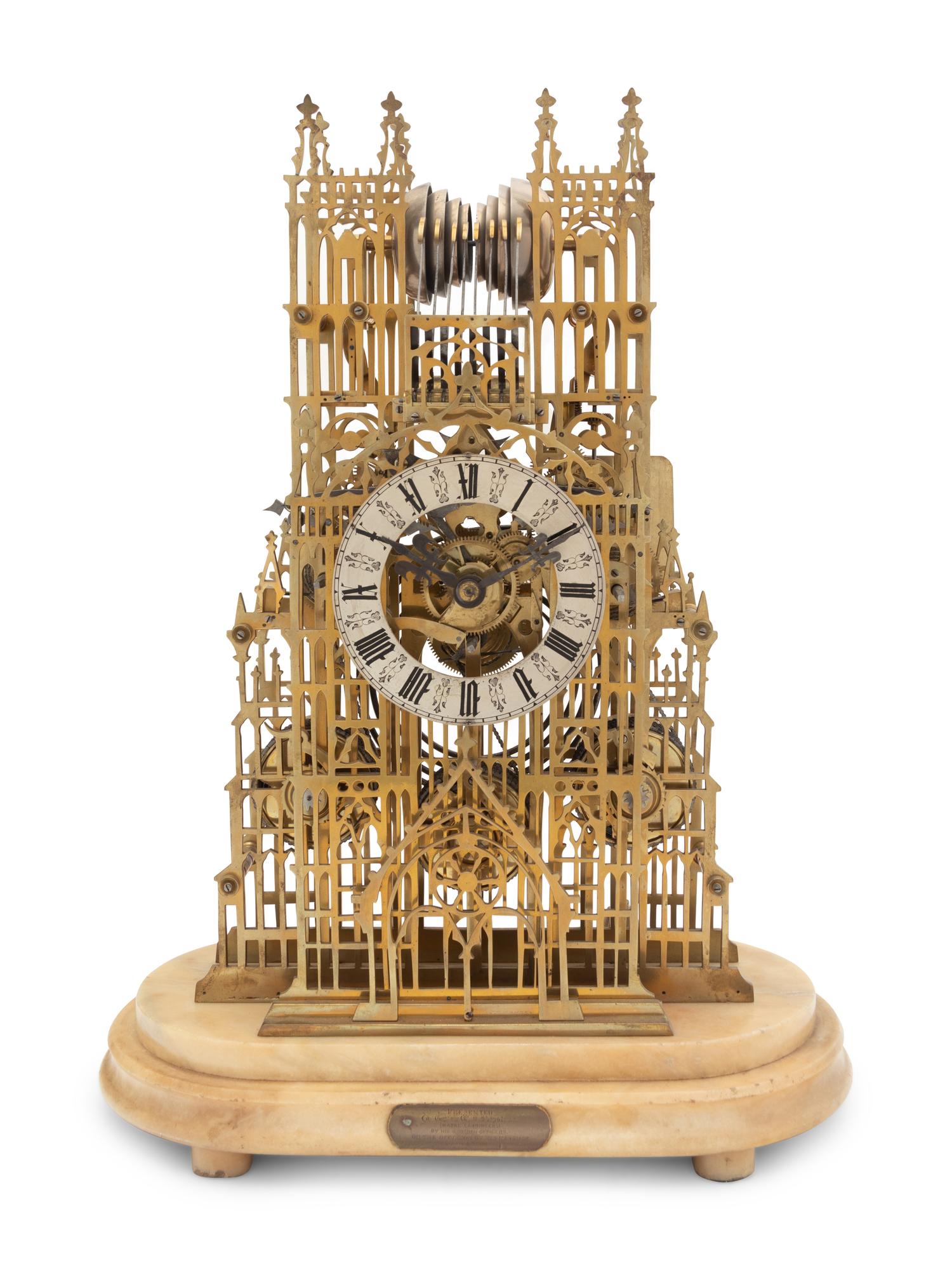 A Victorian Brass Cathedral-Form Skeleton Clock