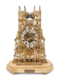 A Victorian Brass Cathedral-Form Skeleton Clock