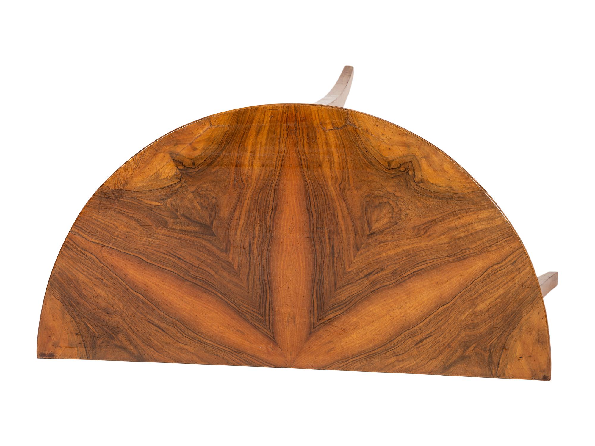 A Biedermeier Figured Birch Demilune Table