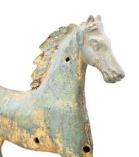A Cast Zinc and Parcel Gilt Molded Copper Trotting Horse Weathervane