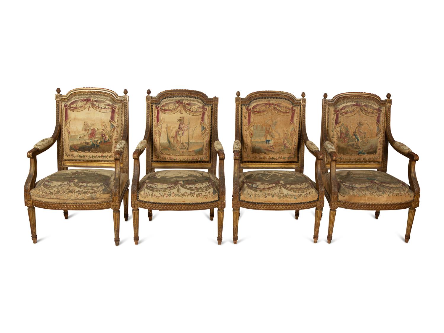 A Set of Four Louis XVI Style Giltwood Fauteuils with Tapestry Upholstery — 19TH CENTURY