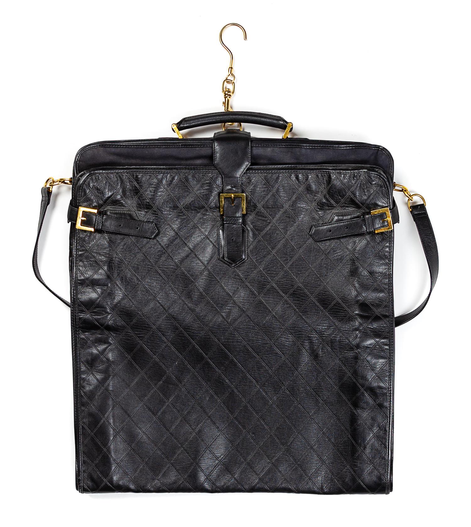 A Chanel Black Lambskin Quilted Garment Bag, 45" L x 24" W.