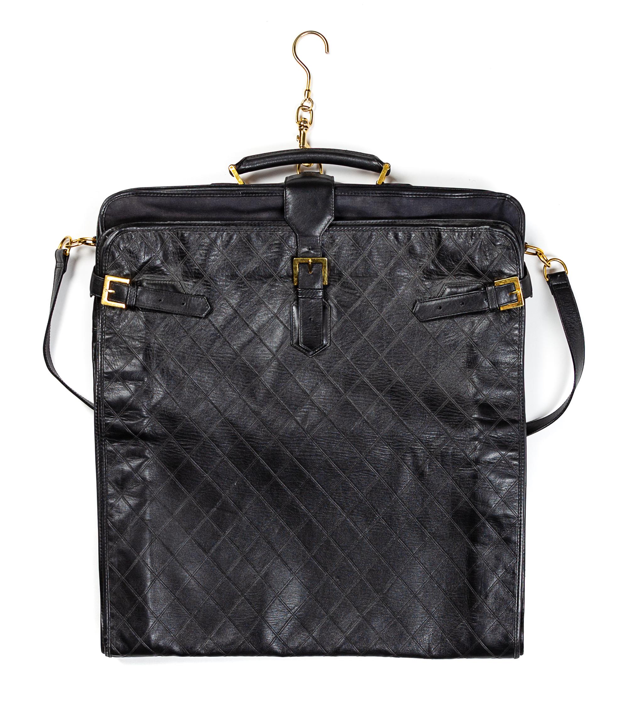 A Chanel Black Lambskin Quilted Garment Bag, 45" L x 24" W.