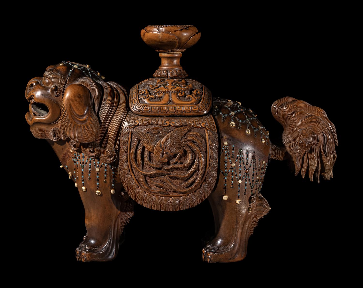 A Japanese Hardstone Inset Carved Boxwood Figure of an Shishi Lion