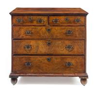 A George II Burlwood Chest of Drawers — MID-18TH CENTURY