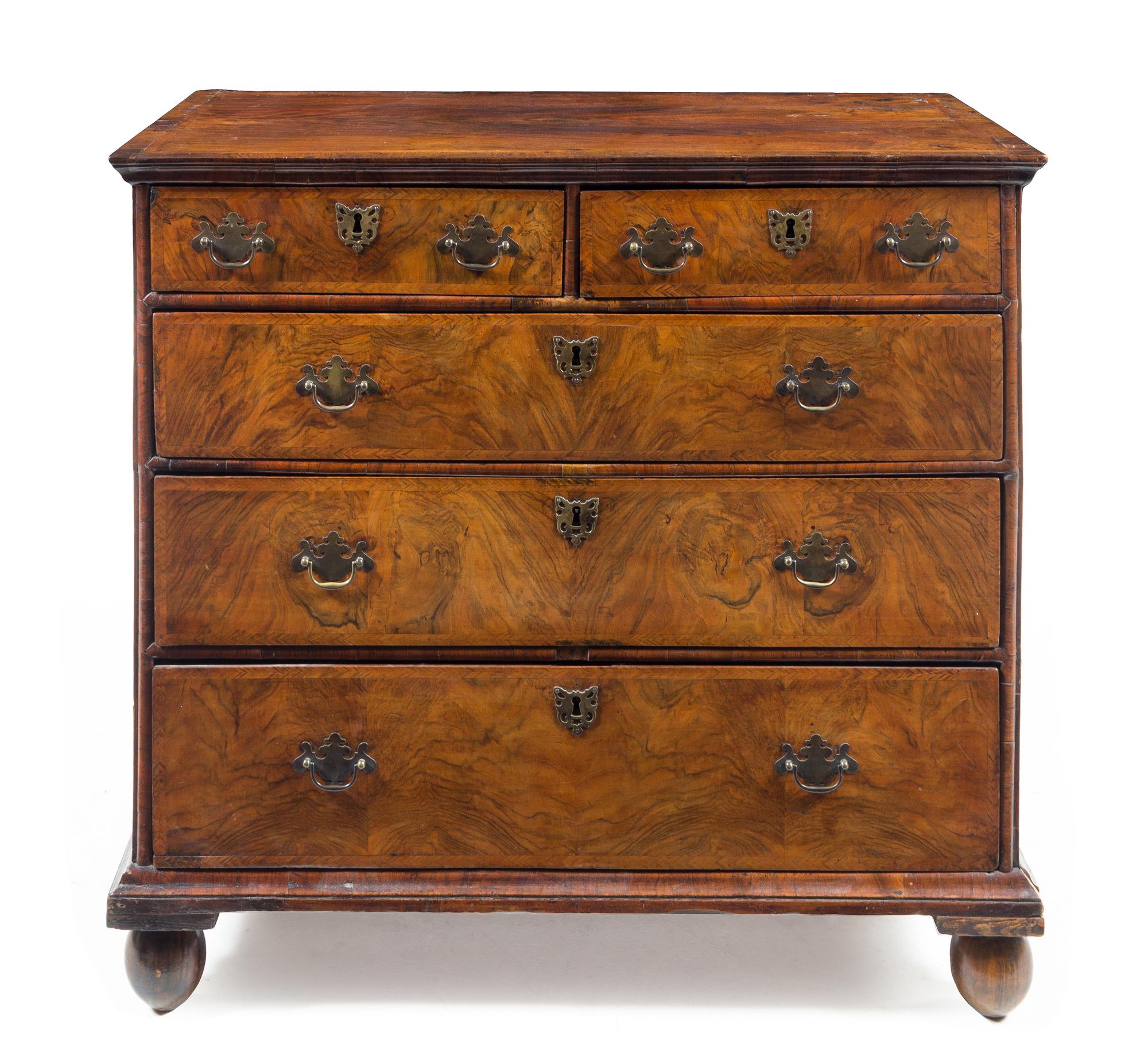 A George II Burlwood Chest of Drawers — MID-18TH CENTURY