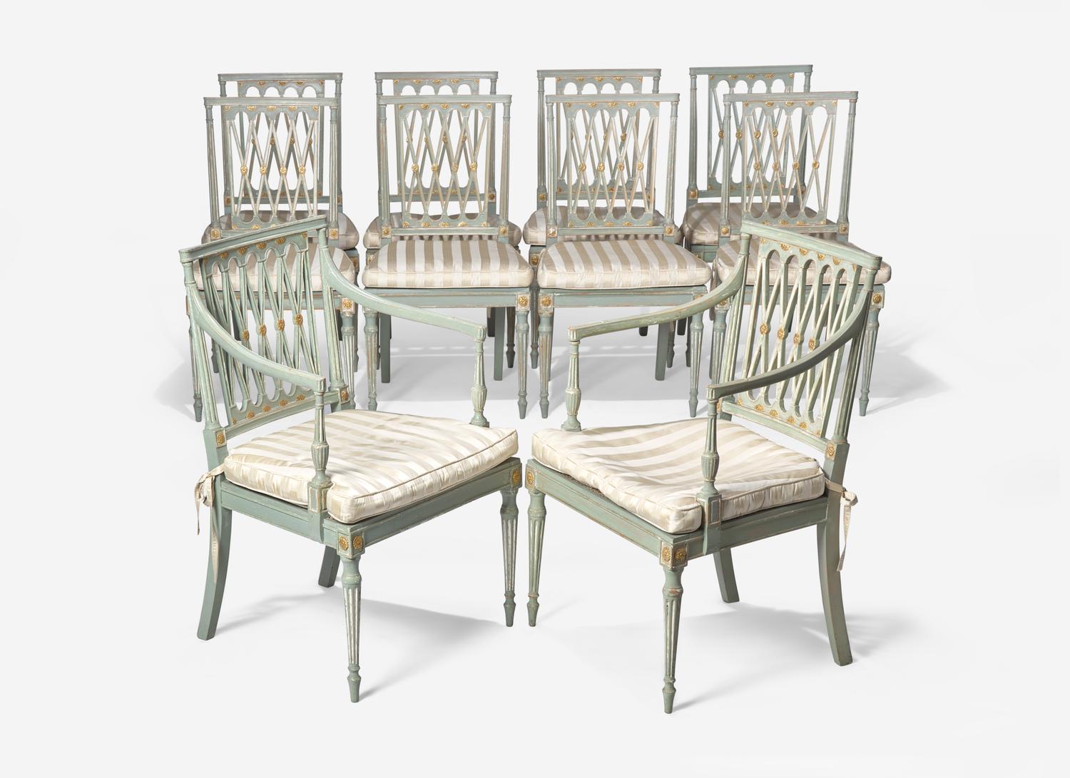 A Set of Ten George III Green and White Painted and Parcel Gilt Lattice Back Dining Chairs