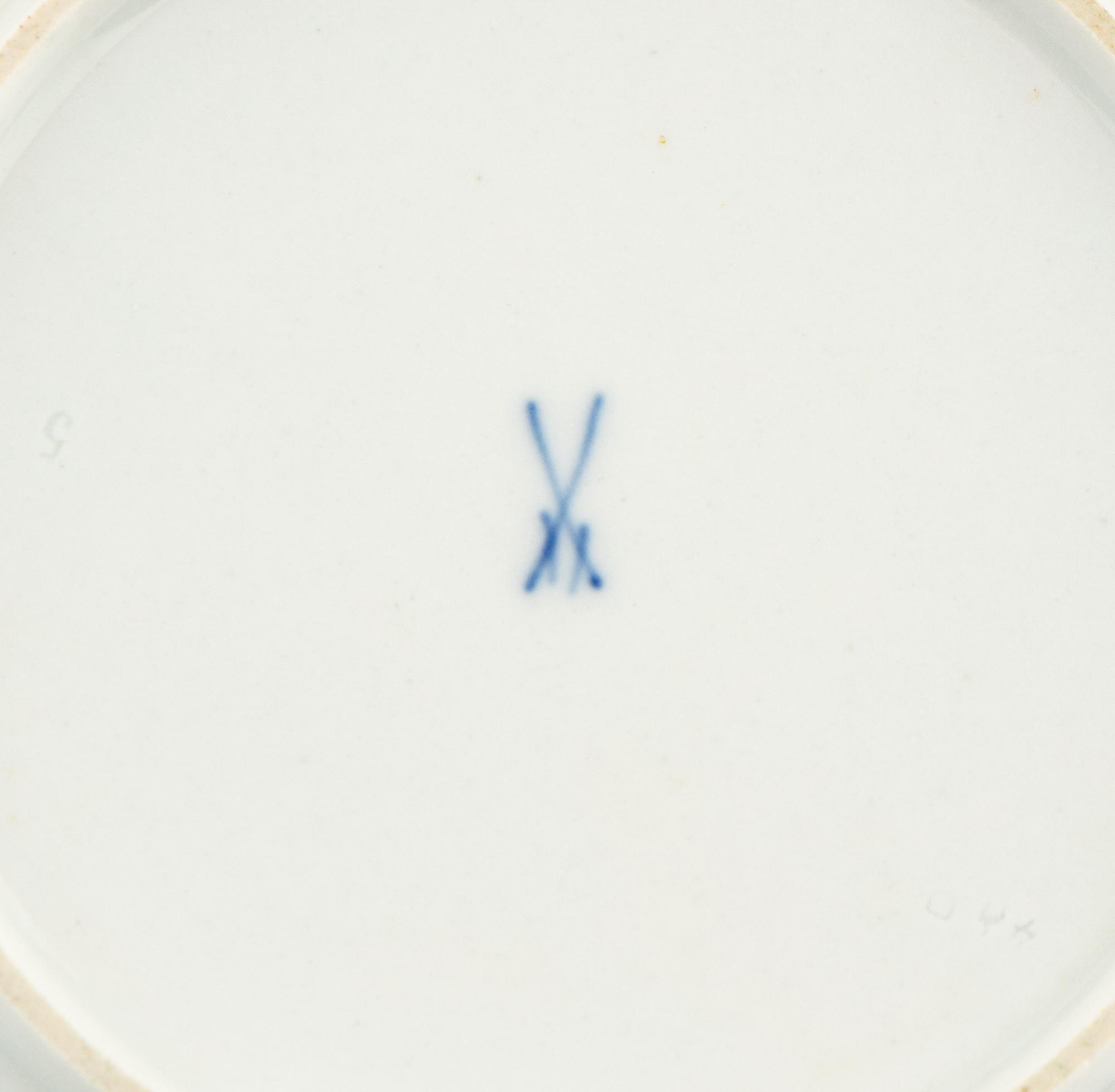 A Set of Twelve Meissen Porcelain Bread Plates