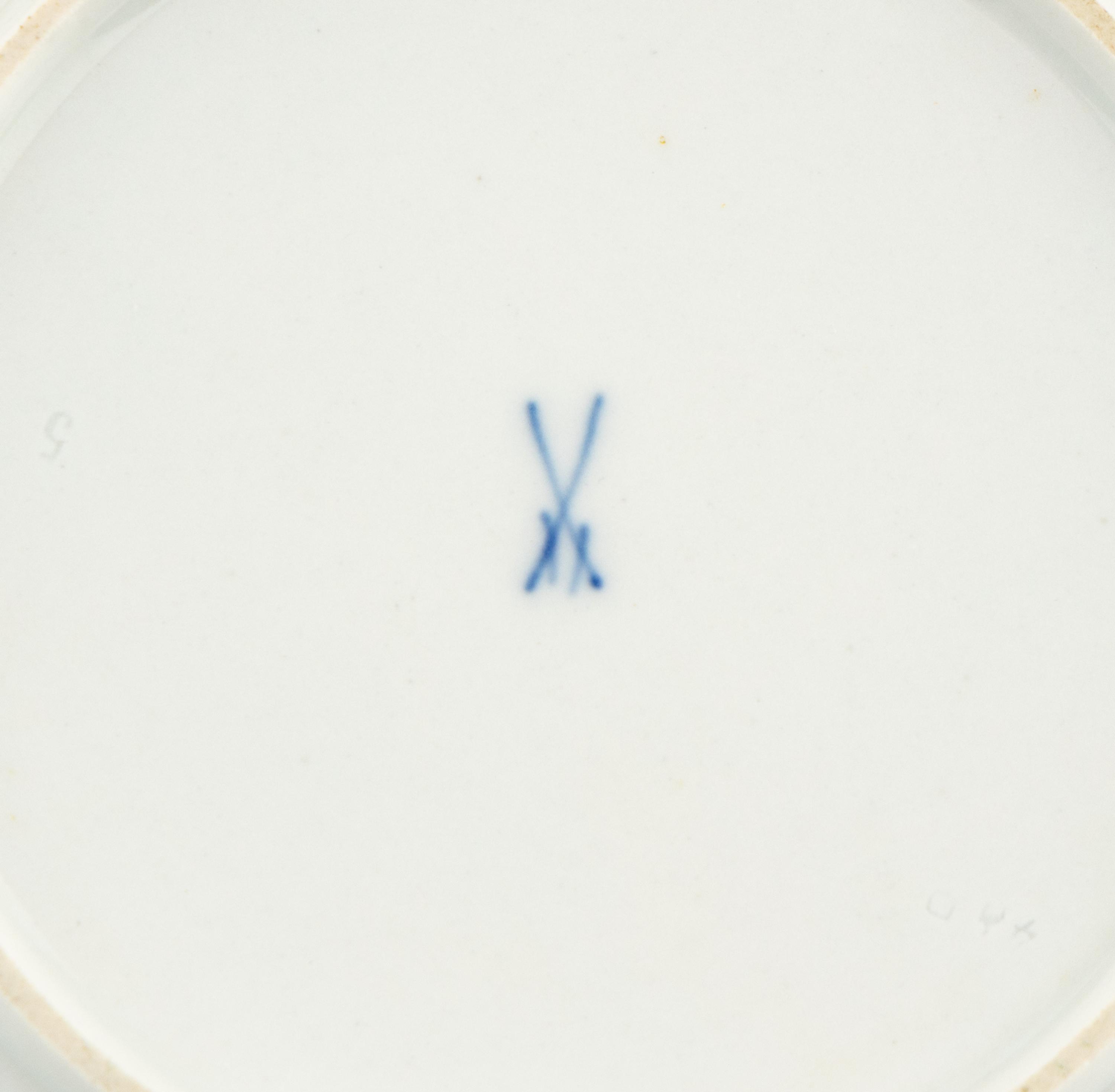 A Set of Twelve Meissen Porcelain Bread Plates