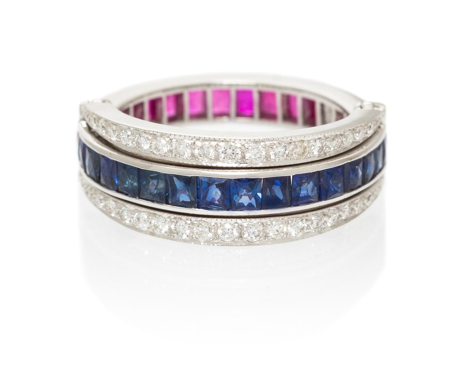 An 18 Karat White Gold, Ruby, Sapphire and Diamond Eternity Flip Ring, 3.50 dwts.