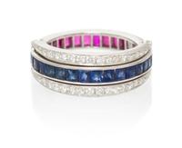 An 18 Karat White Gold, Ruby, Sapphire and Diamond Eternity Flip Ring, 3.50 dwts.