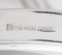 A Set of Eight Puiforcat Silver-Plate Chargers
