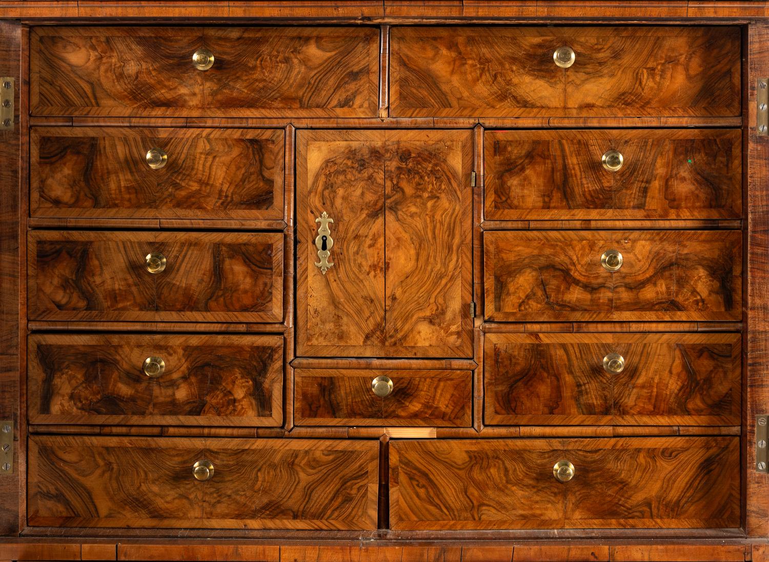 A Queen Anne Walnut Cabinet on Chest