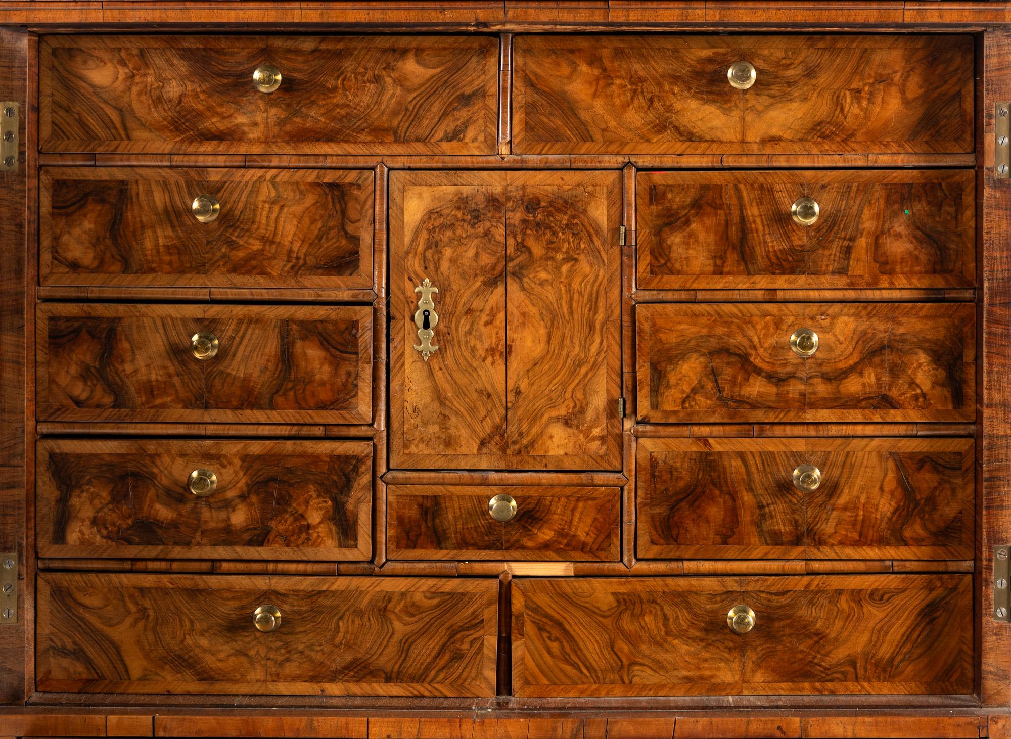 A Queen Anne Walnut Cabinet on Chest