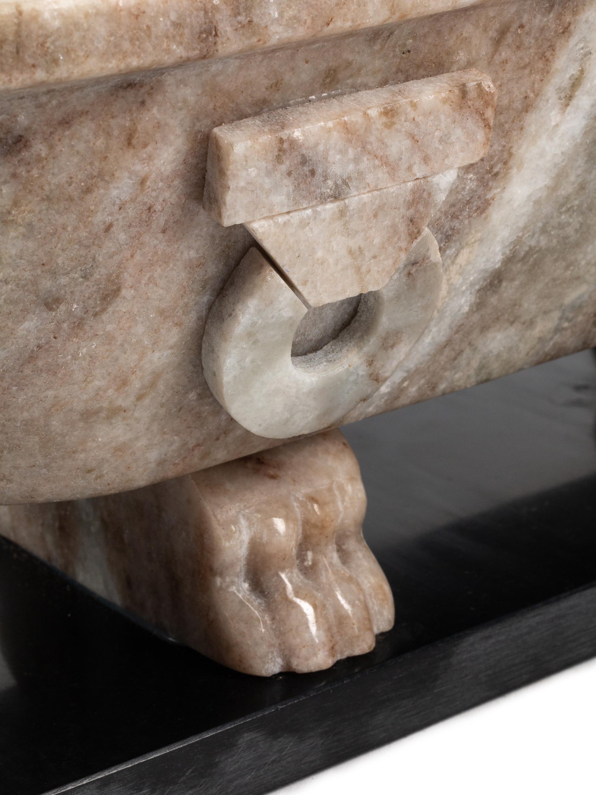 A Pair of Grand Tour Style Marble Sarcophogi