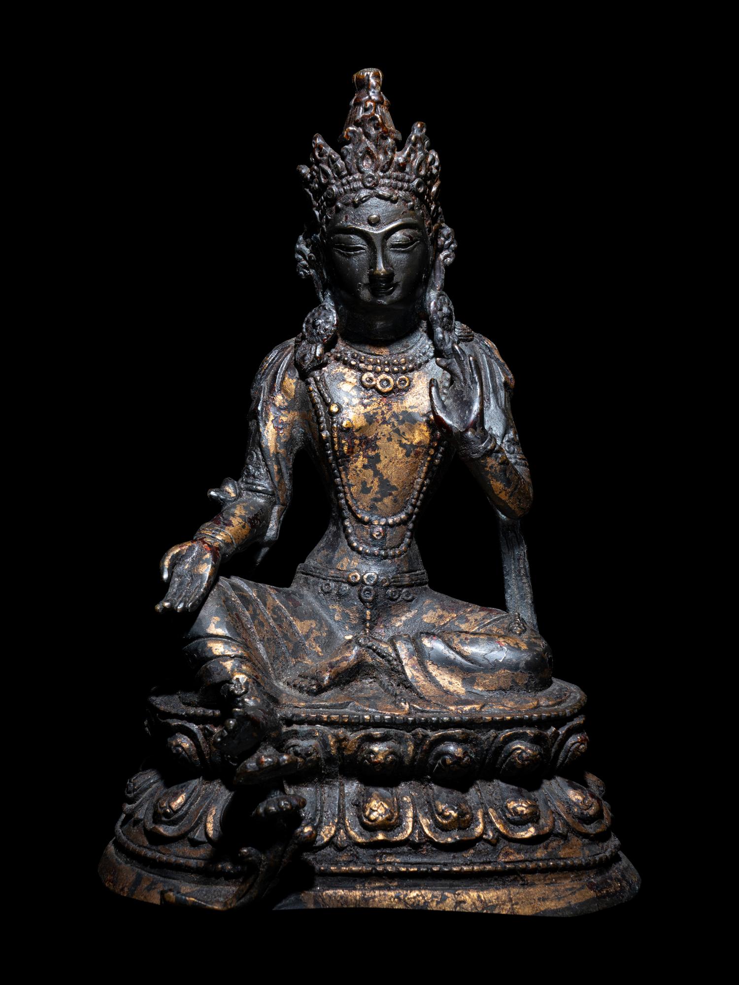 A Sino-Tibetan Parcel Gilt Bronze Figure of a Bodhisattva