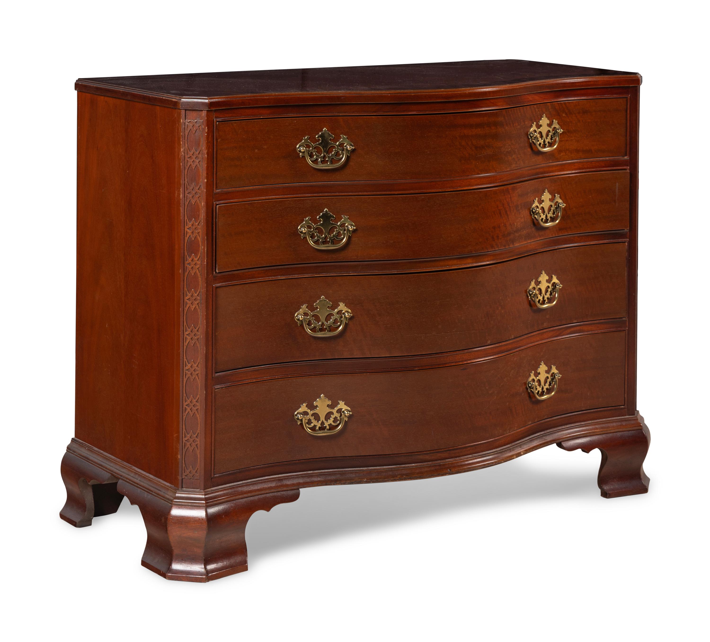 A Pair of George III Style Mahogany Serpentine-Front Chests of Drawers