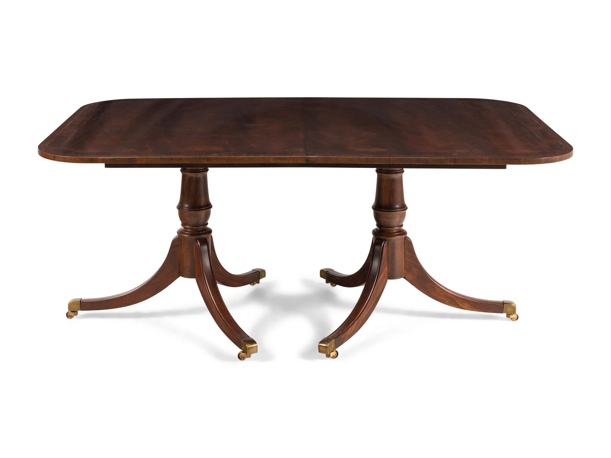 A Regency Style Double Pedestal Dining Table
