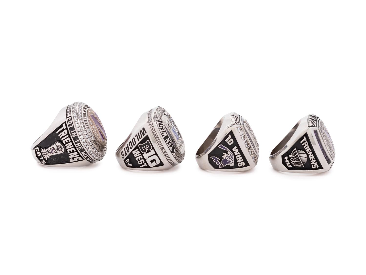 A Group of Four Northwestern University Football and Basketball Championship Rings,