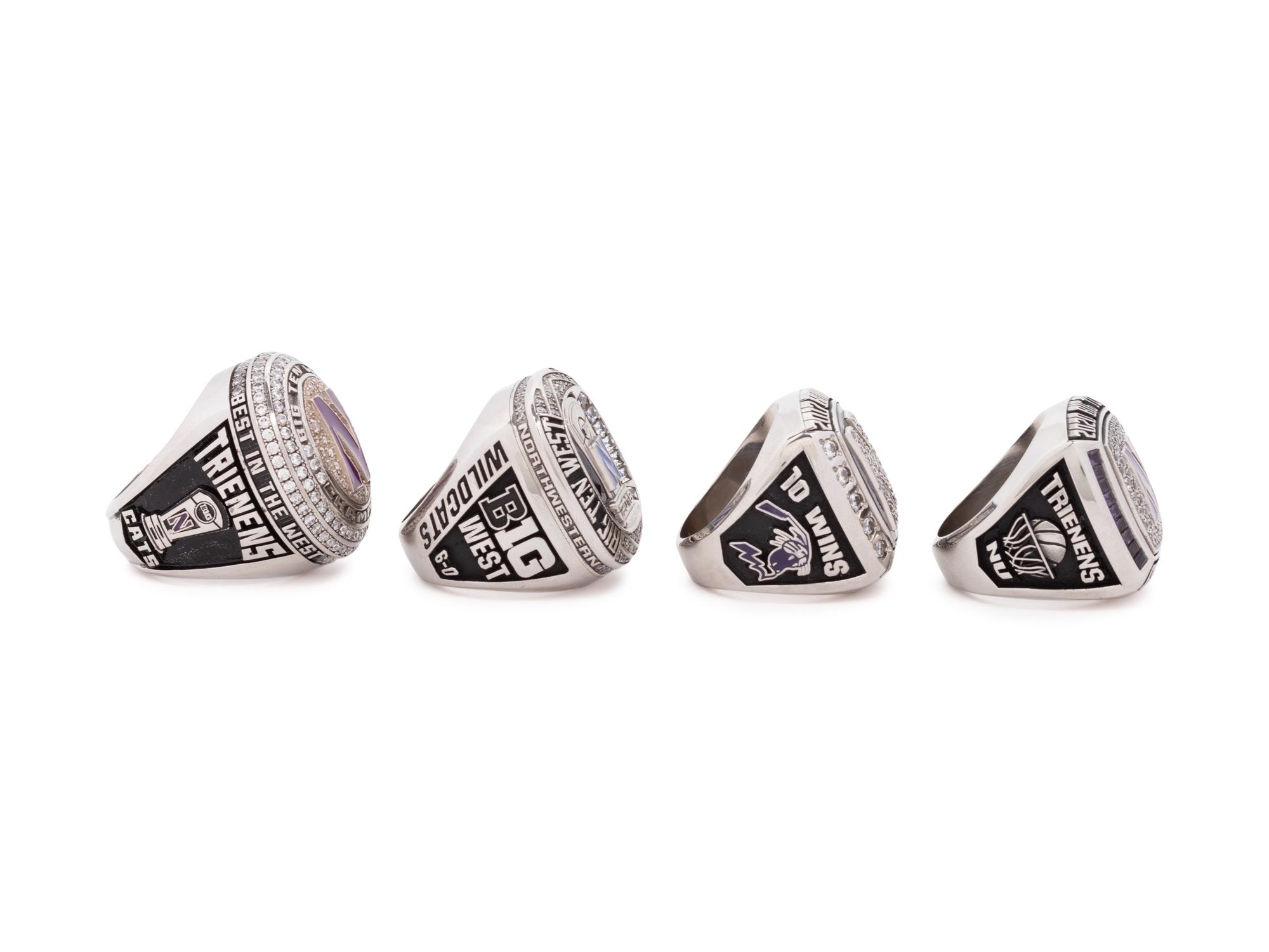 A Group of Four Northwestern University Football and Basketball Championship Rings,