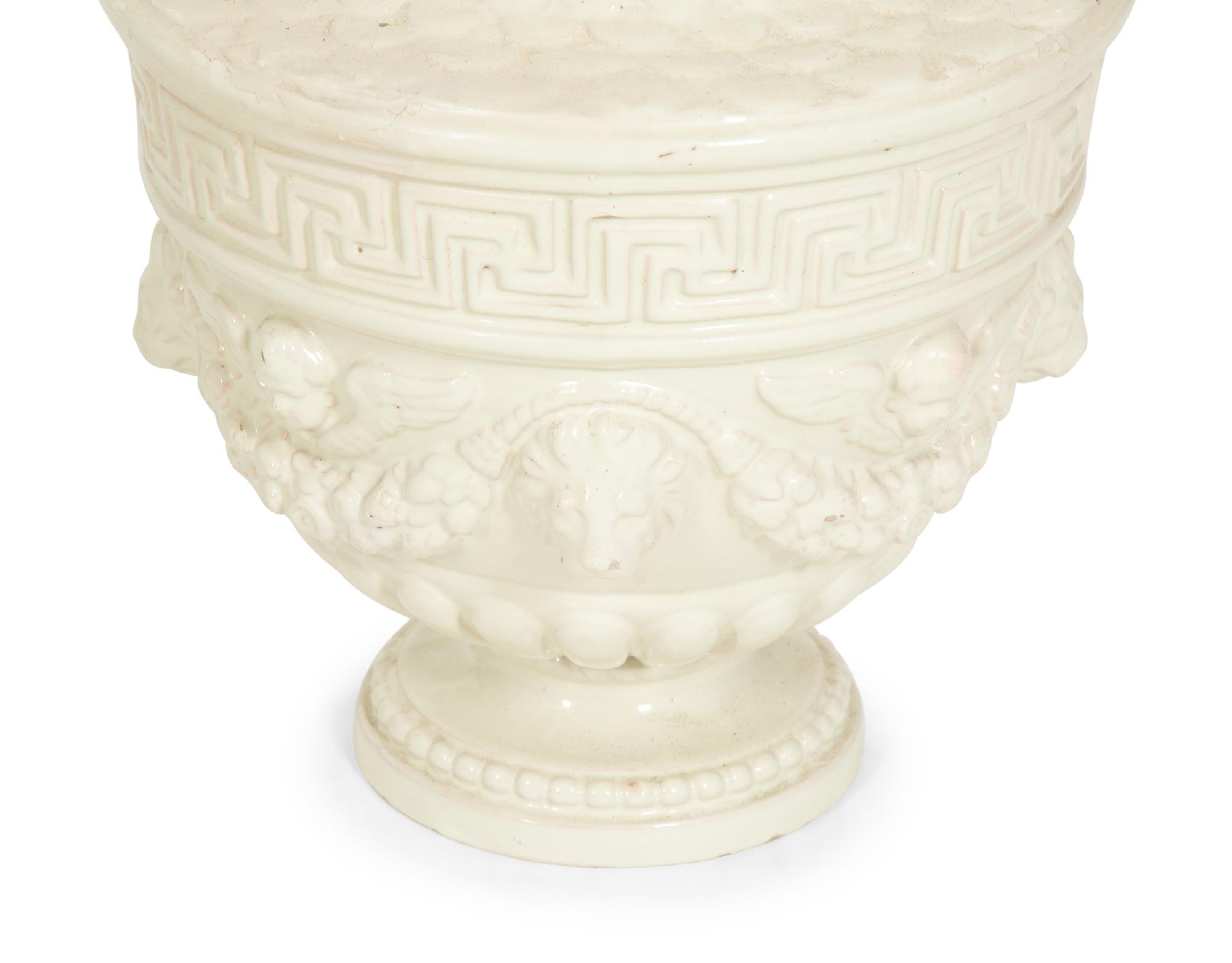 A Pair of Italian White Glazed Ceramic Urns