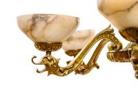 A Pair of Gilt Bronze and Alabaster Six-Light Chandeliers