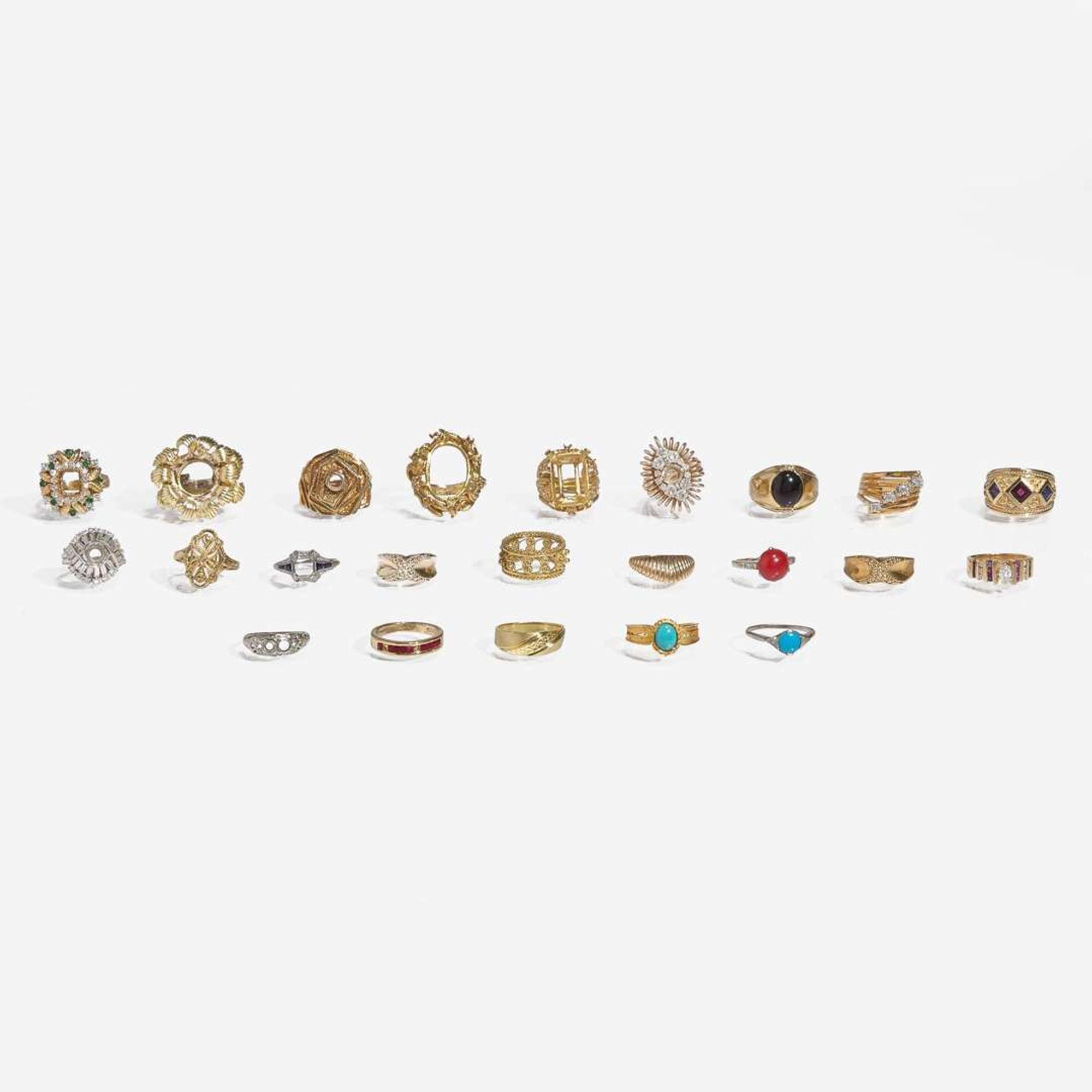 A Collection of 18K Gold and Gemstone Rings