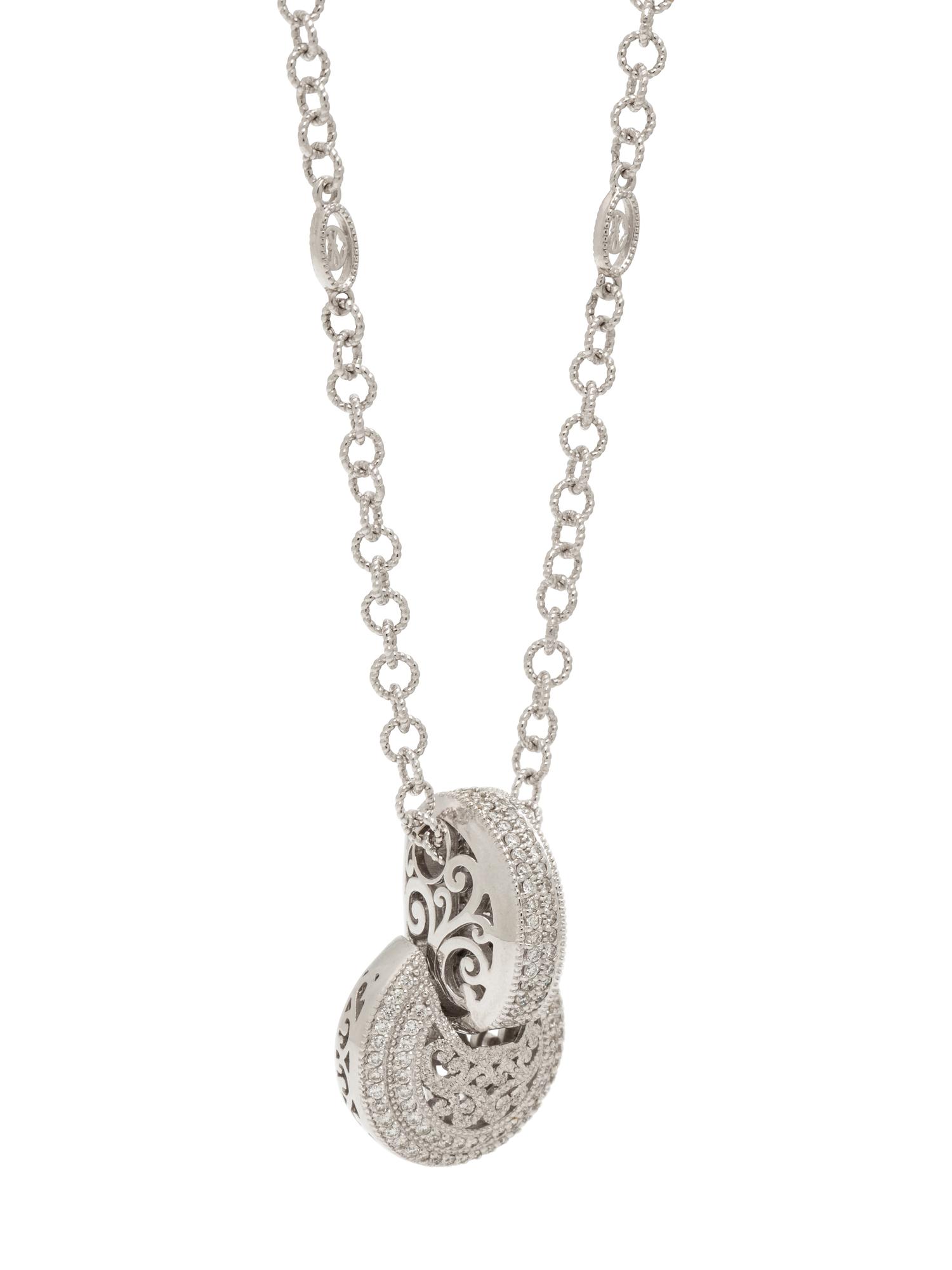CHARIOL, WHITE GOLD AND DIAMOND PENDANT/NECKLACE