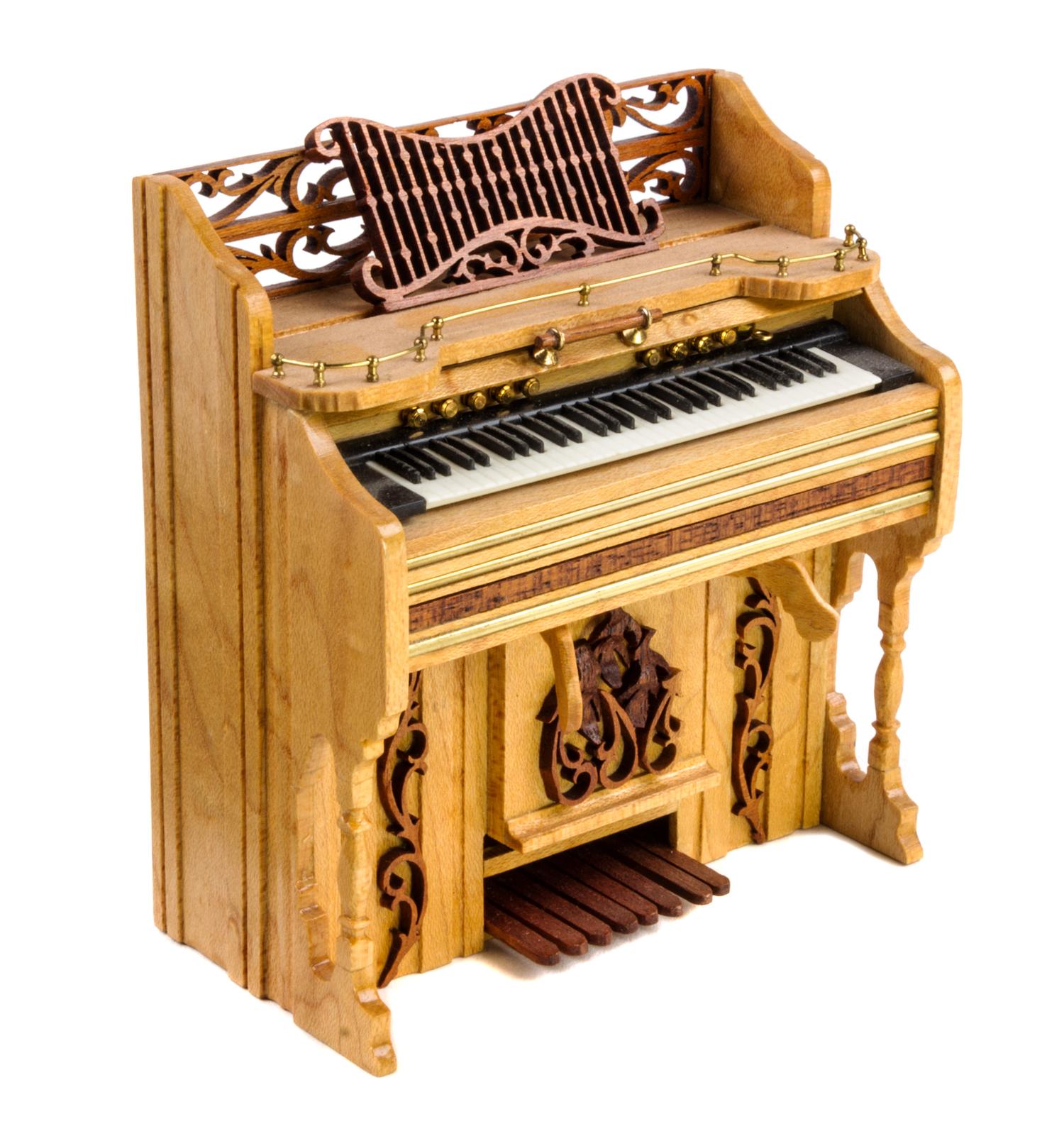An Upright Piano Height 3 3/4 x width 3 1/2 x depth 1 3/4 inches. — Danny Rodriguez