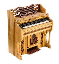 An Upright Piano Height 3 3/4 x width 3 1/2 x depth 1 3/4 inches. — Danny Rodriguez