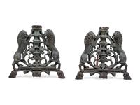 A Pair of Continental Cast Metal Andirons