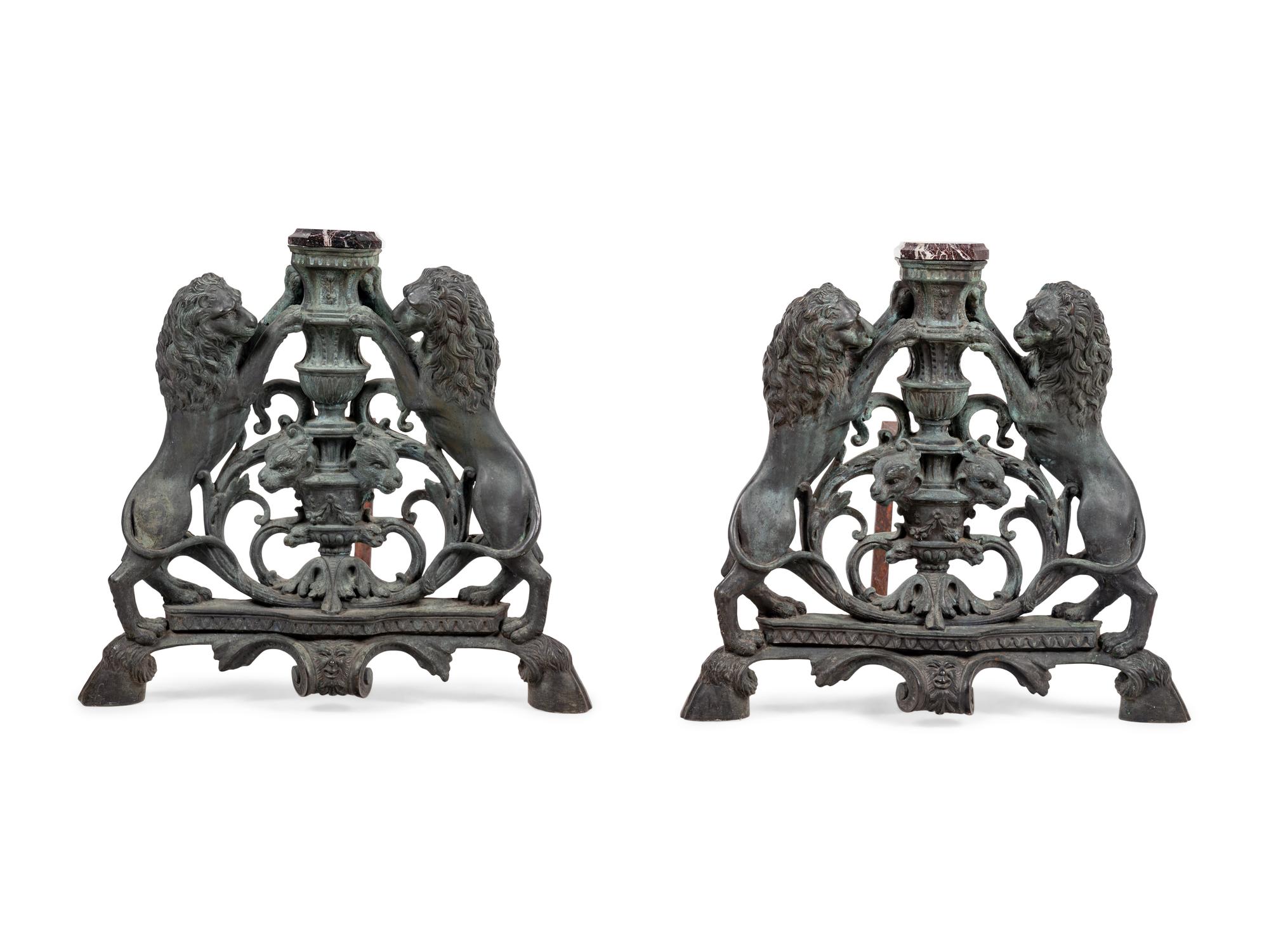 A Pair of Continental Cast Metal Andirons
