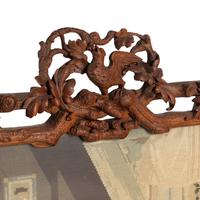 A Swiss "Black Forest" Carved Needlepoint-Inset Firescreen