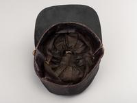 [CIVIL WAR]. A collection of items identified to brothers Robert and Samuel Burnside, Company H, 110th New York Infantry, comprised of a kepi and war-date photographs.