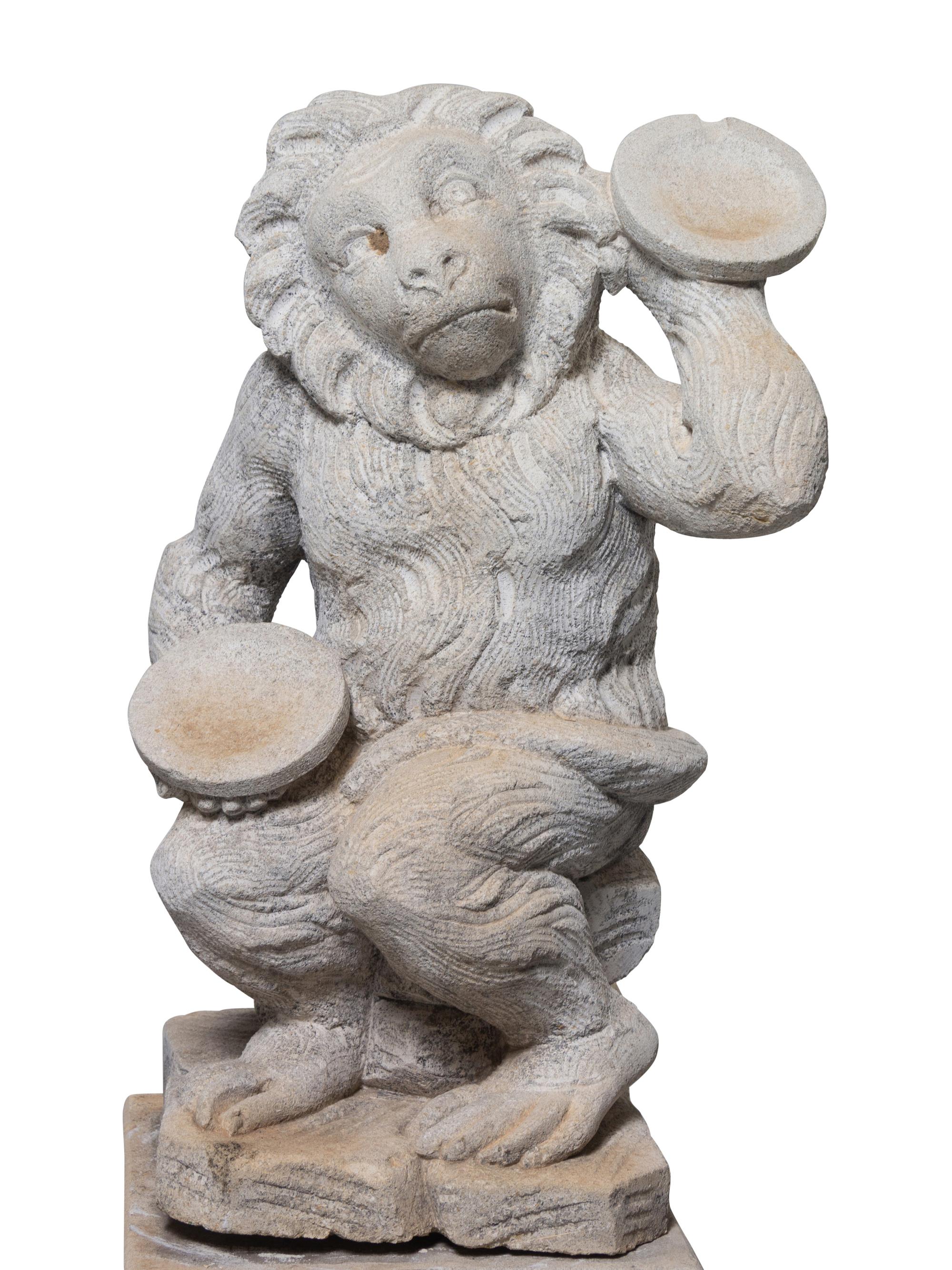 A Set of Four Italian Limestone Figures of Monkey Musicians