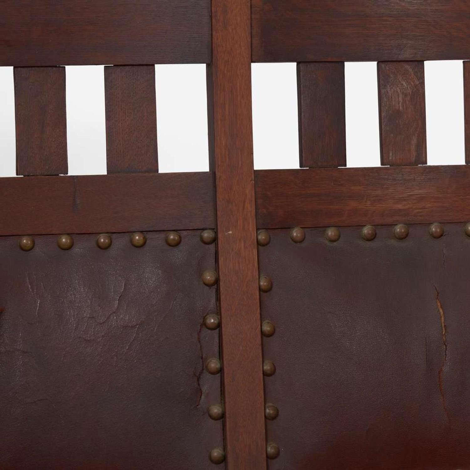 Attributed to Stickley Brothers (American, active 1891-1954) A Settle, Armchair, and Rocking Chair, USA, circa 1905