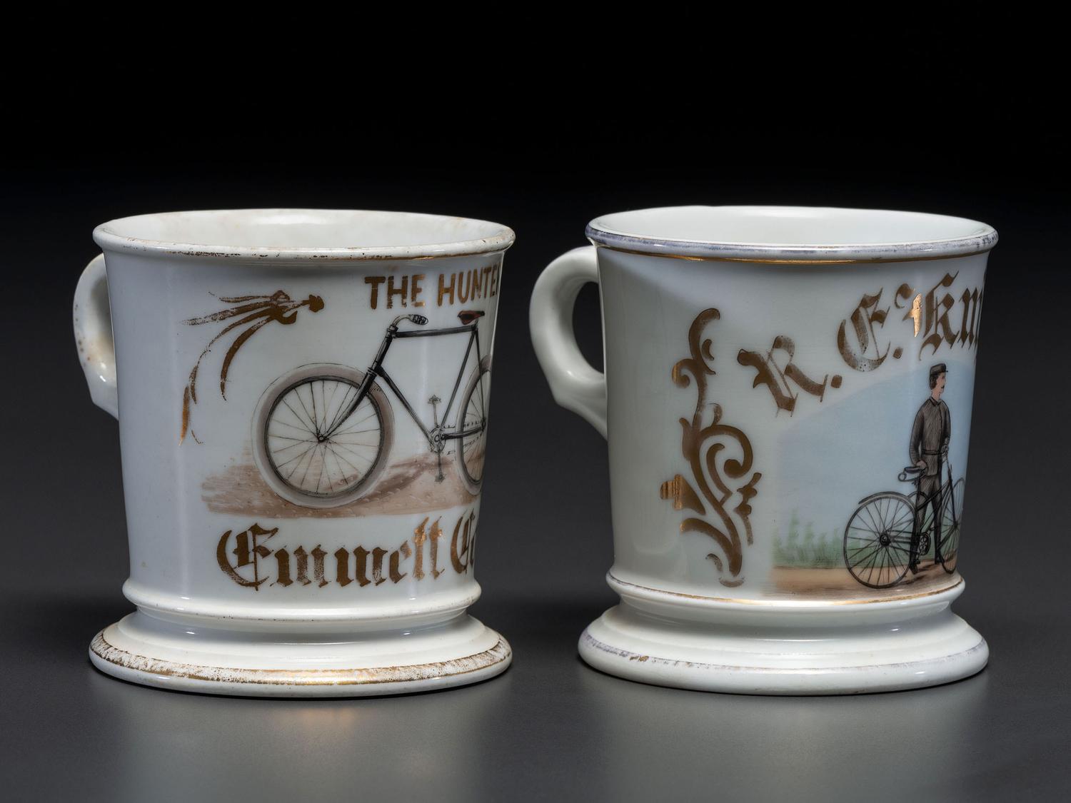 Two Cyclist's Porcelain Shaving Mugs