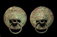A Pair of Roman Bronze Lion-Headed Handles