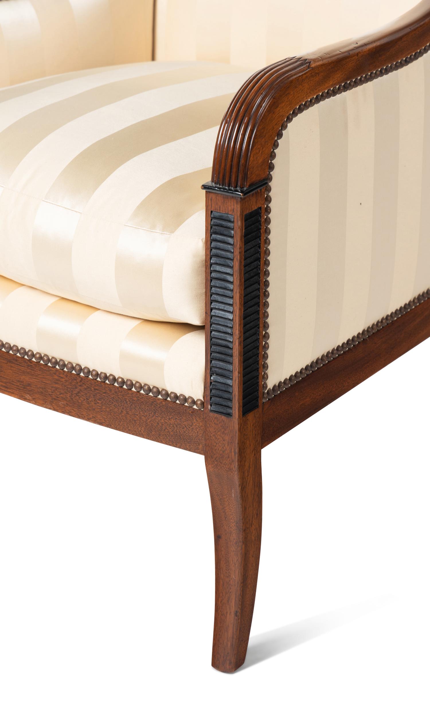 A Pair of Empire Style Mahogany Bergères