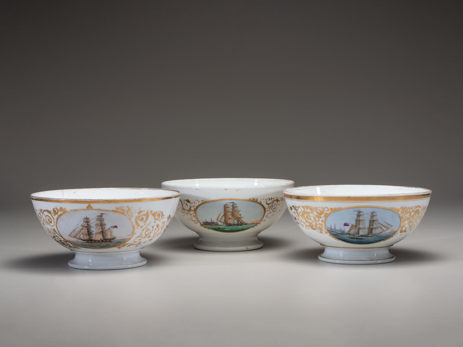 Three English Parcel Gilt and Hand-Painted Porcelain Bowls