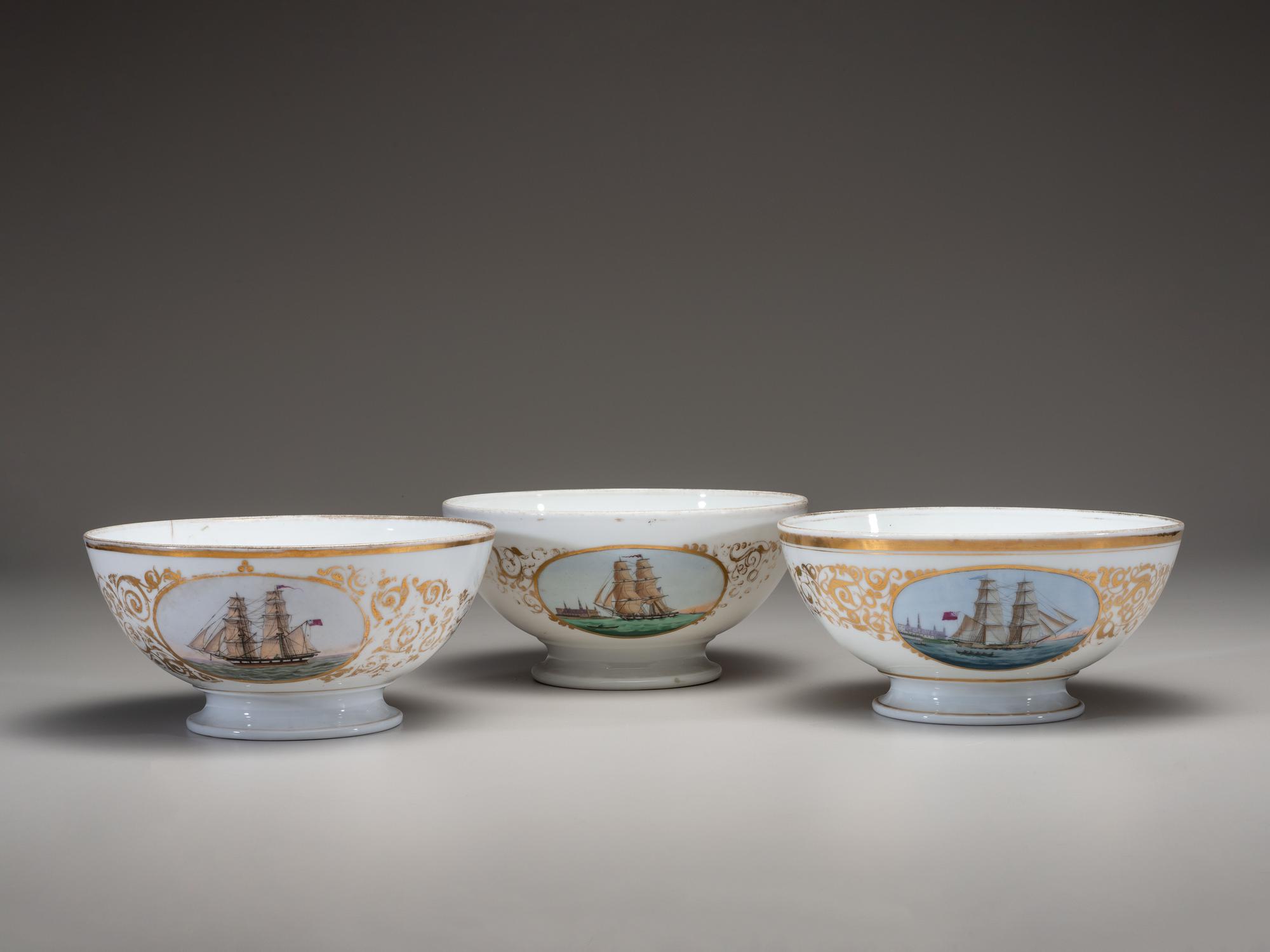 Three English Parcel Gilt and Hand-Painted Porcelain Bowls