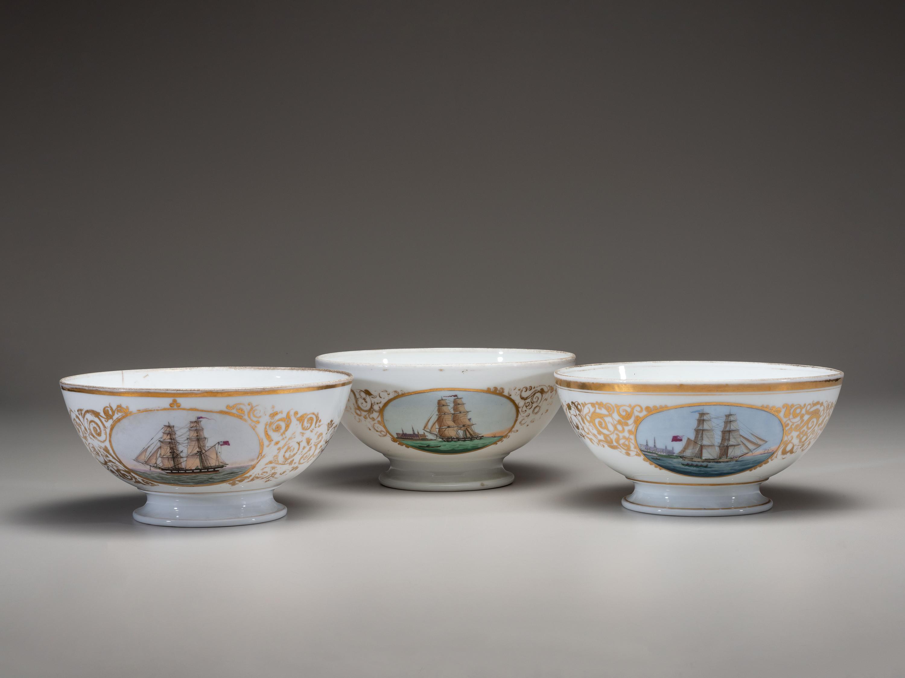Three English Parcel Gilt and Hand-Painted Porcelain Bowls
